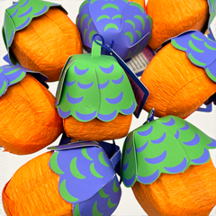 The Curiosity Route Acornspiracy Orb surprise balls with orange crepe paper and green and blue patterned acorn caps.
