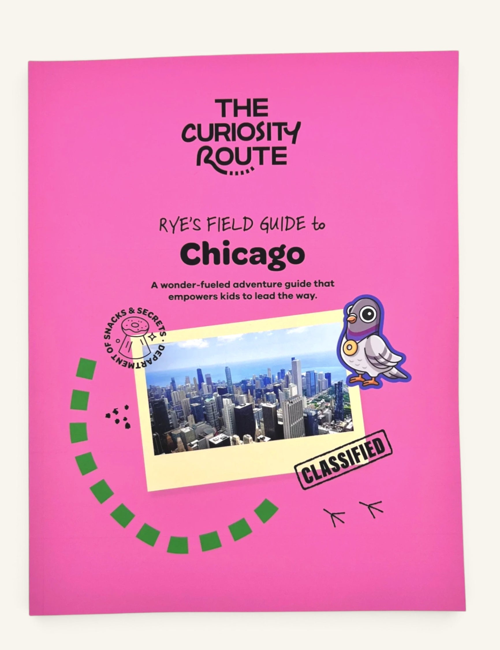 The Curiosity Route Rye's Field Guide to Chicago, a bright pink interactive adventure book for kids exploring the city.