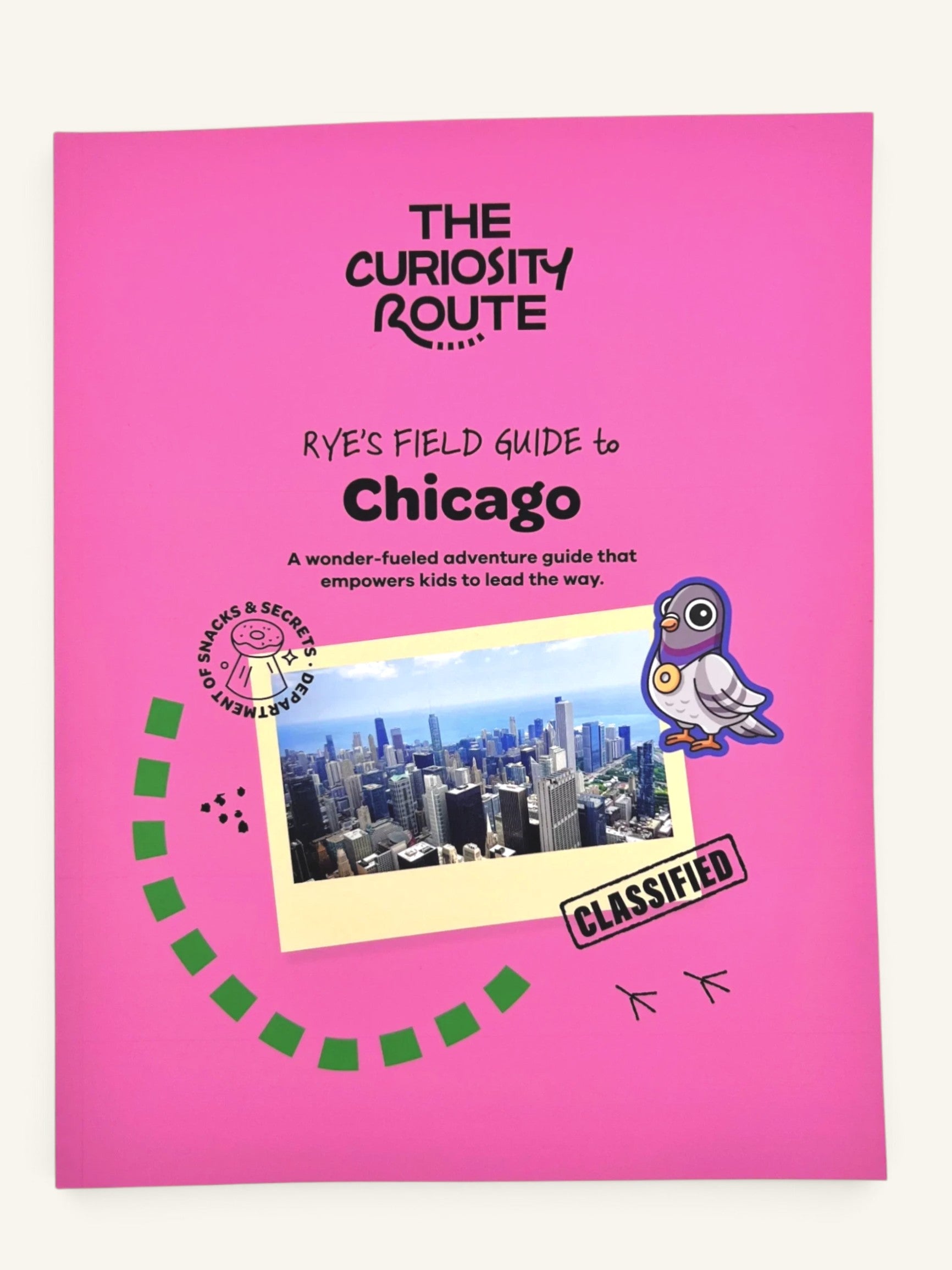 The Curiosity Route Rye's Field Guide to Chicago, a bright pink interactive adventure book for kids exploring the city.