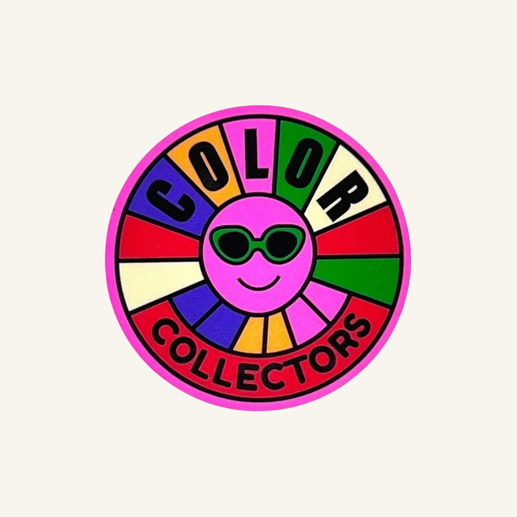 The Curiosity Route round matte vinyl sticker featuring a smiling pink sun with green sunglasses and Color Collectors text